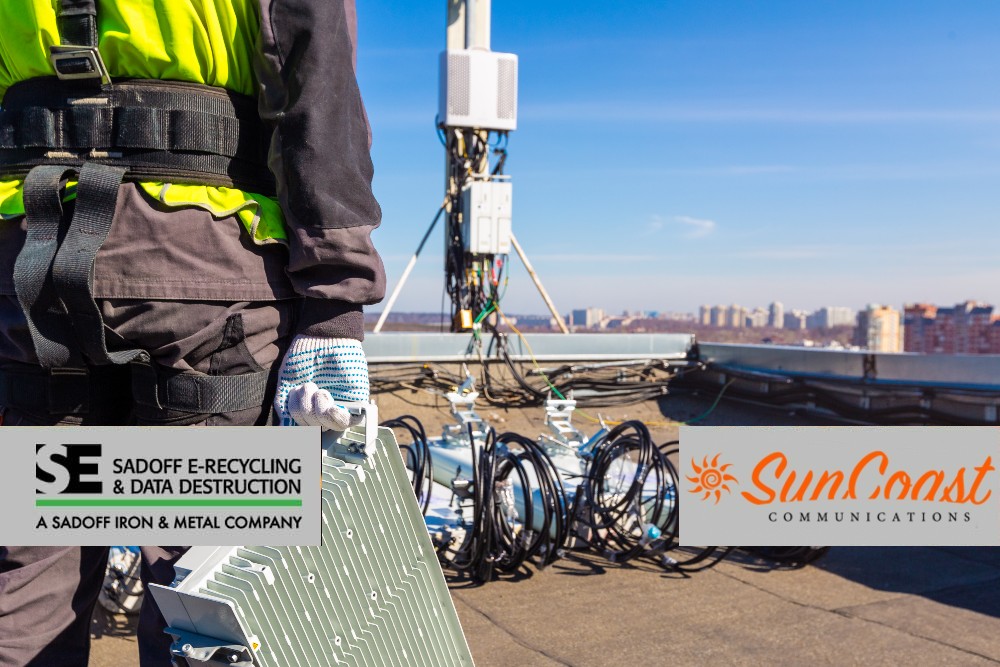 Worker installing telecom equipment on roof and Sadoff +SunCoast logo