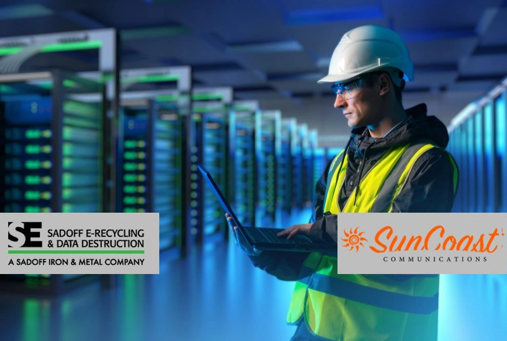 Man in a data center and construction gear with sadoff and suncoast logos