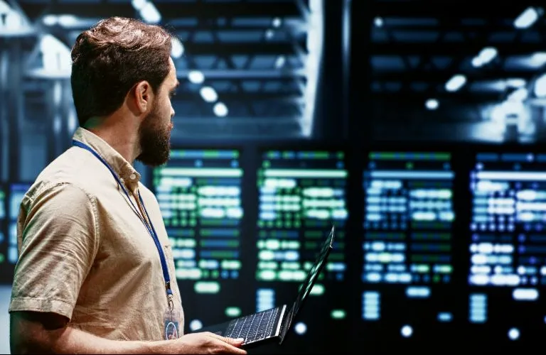 Man overlooking a data center